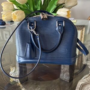 Louis Vuitton Navy Blue Epi Alma bb with silver hardware in excellent condition